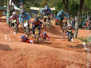 In cross-country bike racing, BMX represents the team Bicycle Moto X (cross).