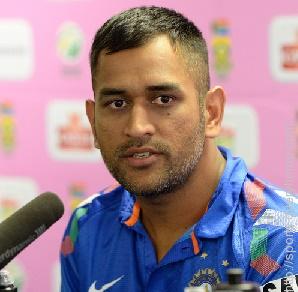 Before making his international debut, Dhoni worked in the Indian Railways as a …...?